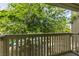 Balcony view looking out to trees and greenery, showing the relaxing outdoor space at 516 Delfern Ln, Las Vegas, NV 89169