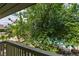 Balcony view overlooking the surrounding greenery and a glimpse of the community pool at 516 Delfern Ln, Las Vegas, NV 89169