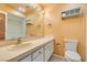 This bathroom features a vanity with ample cabinet space, and toilet at 516 Delfern Ln, Las Vegas, NV 89169