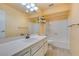 Functional bathroom with vanity, large mirror, tub, and tile floors at 516 Delfern Ln, Las Vegas, NV 89169