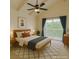 Serene bedroom featuring a private balcony and ample natural light at 516 Delfern Ln, Las Vegas, NV 89169