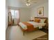 Bright bedroom with light wood furniture and neutral decor at 516 Delfern Ln, Las Vegas, NV 89169