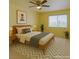 Comfortable bedroom featuring a large window and neutral decor at 516 Delfern Ln, Las Vegas, NV 89169