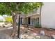 Inviting two-story townhome featuring a private balcony and low-maintenance landscaping at 516 Delfern Ln, Las Vegas, NV 89169