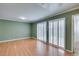 The living room features vinyl floors and shutter doors to the outside at 516 Delfern Ln, Las Vegas, NV 89169