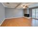 Large living room offers a cozy fireplace and abundant natural light from windows at 516 Delfern Ln, Las Vegas, NV 89169