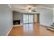 Spacious living room boasts a fireplace and sliding glass doors with natural light at 516 Delfern Ln, Las Vegas, NV 89169