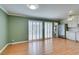 The open floorplan allows for easy flow from kitchen to living space with plenty of natural light at 516 Delfern Ln, Las Vegas, NV 89169