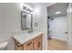 Modern bathroom featuring a stylish vanity, a framed mirror, and updated lighting at 5335 Rod Ct # 103, Las Vegas, NV 89122