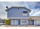 Blue two-story condominium with a private entrance and carport parking at 5335 Rod Ct # 103, Las Vegas, NV 89122