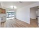 Open floor plan with views of the kitchen and a sliding glass door at 5335 Rod Ct # 103, Las Vegas, NV 89122