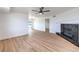 Open floor plan with luxury vinyl plank flooring, fireplace, and lots of space at 5335 Rod Ct # 103, Las Vegas, NV 89122