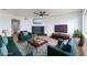 Bright living room is furnished with new decor and has views of the fireplace at 5335 Rod Ct # 103, Las Vegas, NV 89122