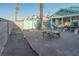 The property has a fully fenced backyard, a covered patio, and a small storage shed at 553 Dutchman Ave, Henderson, NV 89011