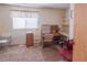 Spare bedroom featuring large desk, shelves, and natural light at 553 Dutchman Ave, Henderson, NV 89011