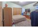 Cozy bedroom featuring carpet, closet and TV at 553 Dutchman Ave, Henderson, NV 89011
