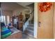 Inviting entryway with staircase and functional furniture at 553 Dutchman Ave, Henderson, NV 89011