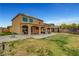 Spacious backyard with patio, perfect for entertaining or relaxing outdoors at 5642 Breckenridge St, North Las Vegas, NV 89081