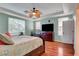 Comfortable bedroom with ample natural light and ceiling fan at 5642 Breckenridge St, North Las Vegas, NV 89081