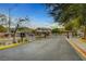View of the secure gated community entrance, showcasing landscaping and controlled access at 5642 Breckenridge St, North Las Vegas, NV 89081