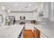 Well-appointed kitchen with a large island, stainless appliances, and modern lighting at 5642 Breckenridge St, North Las Vegas, NV 89081