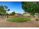 Community park features green space, mature trees, seating, and walking paths at 5642 Breckenridge St, North Las Vegas, NV 89081
