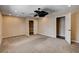 Bedroom featuring plush carpet, closet, and ceiling fan at 6117 Foxcroft Ave, Las Vegas, NV 89108