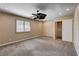 Bedroom featuring a modern ceiling fan and sliding closet doors at 6117 Foxcroft Ave, Las Vegas, NV 89108