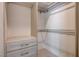 Organized walk-in closet with custom shelves and drawers at 6117 Foxcroft Ave, Las Vegas, NV 89108
