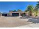 Charming single-story house featuring a spacious driveway and attached garage at 6117 Foxcroft Ave, Las Vegas, NV 89108