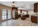 Bright kitchen offering tiled floors, modern appliances, and access to the backyard at 6117 Foxcroft Ave, Las Vegas, NV 89108