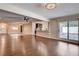Bright living room with hardwood floors and access to the backyard patio at 6117 Foxcroft Ave, Las Vegas, NV 89108