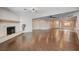Spacious living room with hardwood floors and fireplace at 6117 Foxcroft Ave, Las Vegas, NV 89108