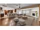 Open-concept living room connects seamlessly to kitchen and features a fireplace at 6117 Foxcroft Ave, Las Vegas, NV 89108