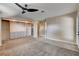 Bright main bedroom with built-in cabinets and carpet at 6117 Foxcroft Ave, Las Vegas, NV 89108