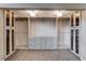 Spacious walk-in closet with custom shelving and drawers at 6117 Foxcroft Ave, Las Vegas, NV 89108