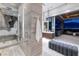 Modern bathroom featuring a glass shower, sleek hardware, and an open layout with city views at 621 Majestic Rim Dr, Henderson, NV 89012