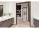 Elegant bathroom featuring modern fixtures, tiled floors, and a luxurious, spa-like atmosphere at 621 Majestic Rim Dr, Henderson, NV 89012