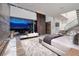 Spacious primary bedroom with city view, featuring a cozy rug, and access to an outdoor seating area at 621 Majestic Rim Dr, Henderson, NV 89012