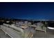 Expansive patio with comfortable seating and a stunning city view at 621 Majestic Rim Dr, Henderson, NV 89012