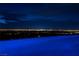 Infinity pool at twilight showcasing city views at 621 Majestic Rim Dr, Henderson, NV 89012