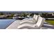 Stunning pool deck with chic lounge chairs and panoramic city views, perfect for outdoor entertainment at 621 Majestic Rim Dr, Henderson, NV 89012