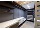 Modern walk-in closet with custom shelving and drawers, providing ample storage and organization at 621 Majestic Rim Dr, Henderson, NV 89012