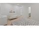 Bright bedroom with stylish decor, including a crib and neutral color palette at 6270 Lamont Hills Ave, Las Vegas, NV 89139