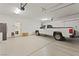 Spacious garage with epoxy flooring and ample storage at 6270 Lamont Hills Ave, Las Vegas, NV 89139