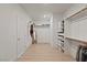 Well-organized walk-in closet with shelving and hanging rods, ideal for wardrobe storage at 6270 Lamont Hills Ave, Las Vegas, NV 89139