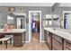 Bathroom featuring a make-up vanity, sink, and a peek into the walk-in closet with custom organizers at 6379 Dundock Ave, Las Vegas, NV 89122