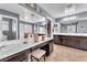 Bathroom featuring an expansive vanity with a makeup area, vanity lighting, and tile flooring at 6379 Dundock Ave, Las Vegas, NV 89122