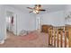 Charming bedroom featuring a ceiling fan, vintage dresser, and cozy decor for a warm, inviting space at 6379 Dundock Ave, Las Vegas, NV 89122
