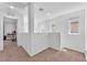 Bright hallway on the second floor with white walls and carpet flooring at 6379 Dundock Ave, Las Vegas, NV 89122